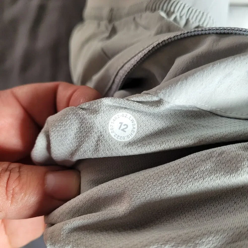Lululemon Womens 12 Gray Cargo Multi Pocket HR Hiking High Rise Skort Lined Euc